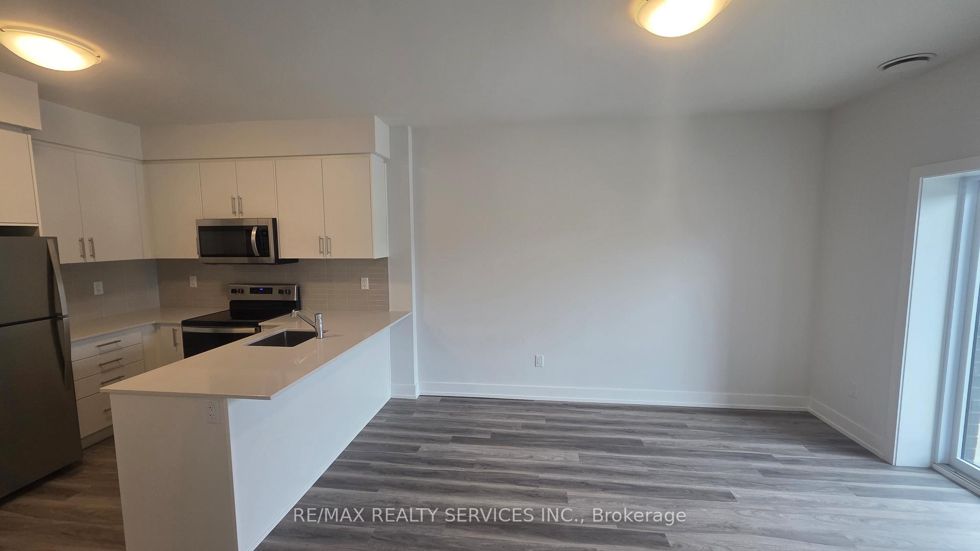 Photo 5 of Unit 411, 1100 Lackner Place, Kitchener — HOMEH