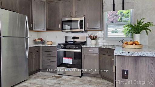Photo 2 of 24 MacPherson Crescent, Hamilton, Rural Flamborough — HOMEH