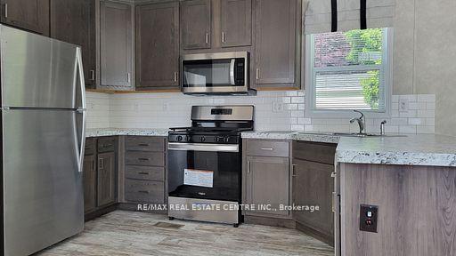 Photo 13 of 24 MacPherson Crescent, Hamilton, Rural Flamborough — HOMEH