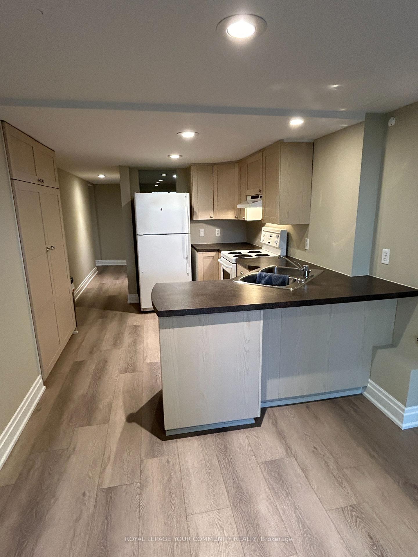 Photo 2 of Unit Lower, 2 Rougecrest Drive, Markham, Markham Village — HOMEH