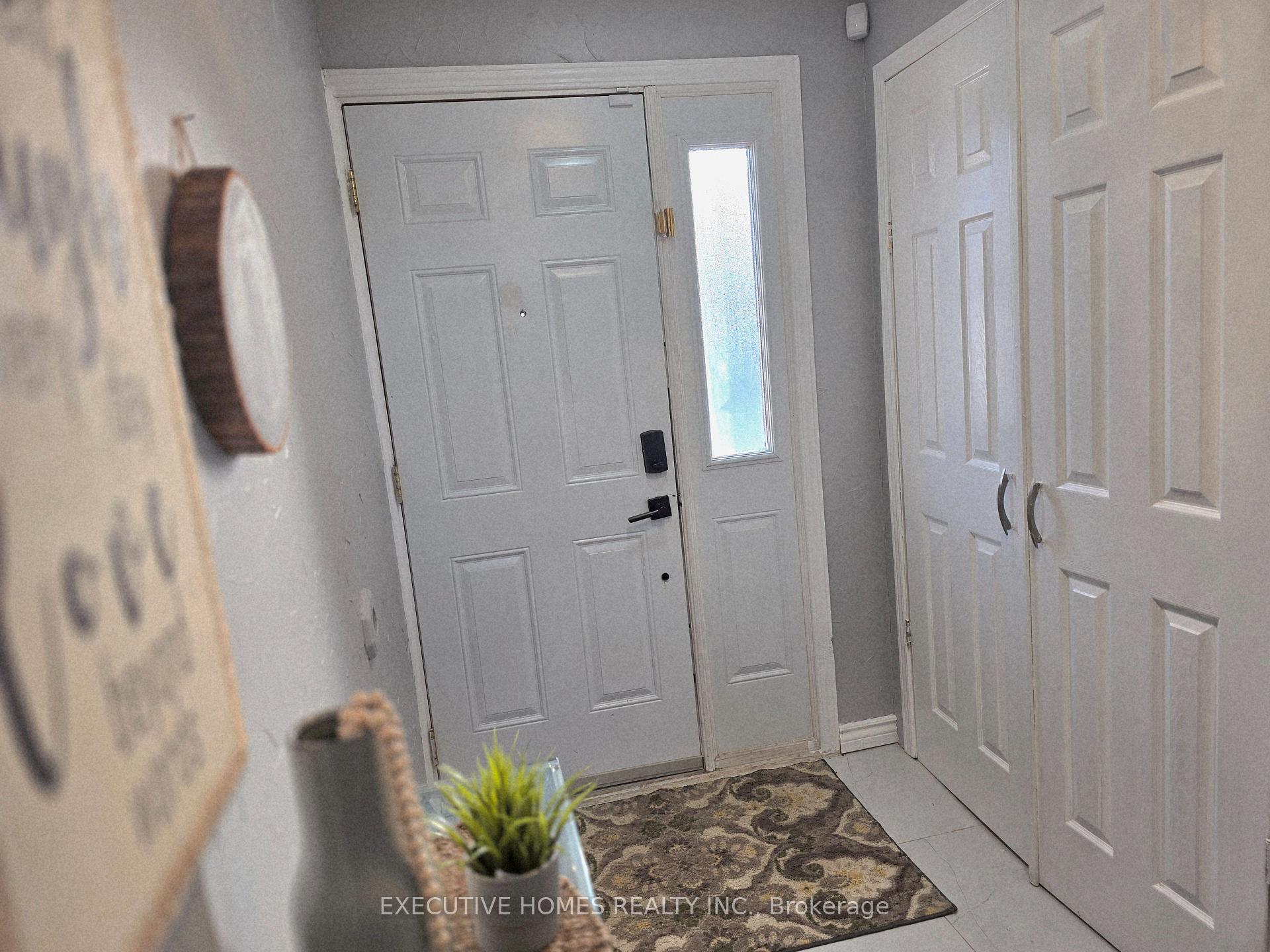 Photo 5 of 61 Collins Crescent, Brampton, Brampton North — HOMEH