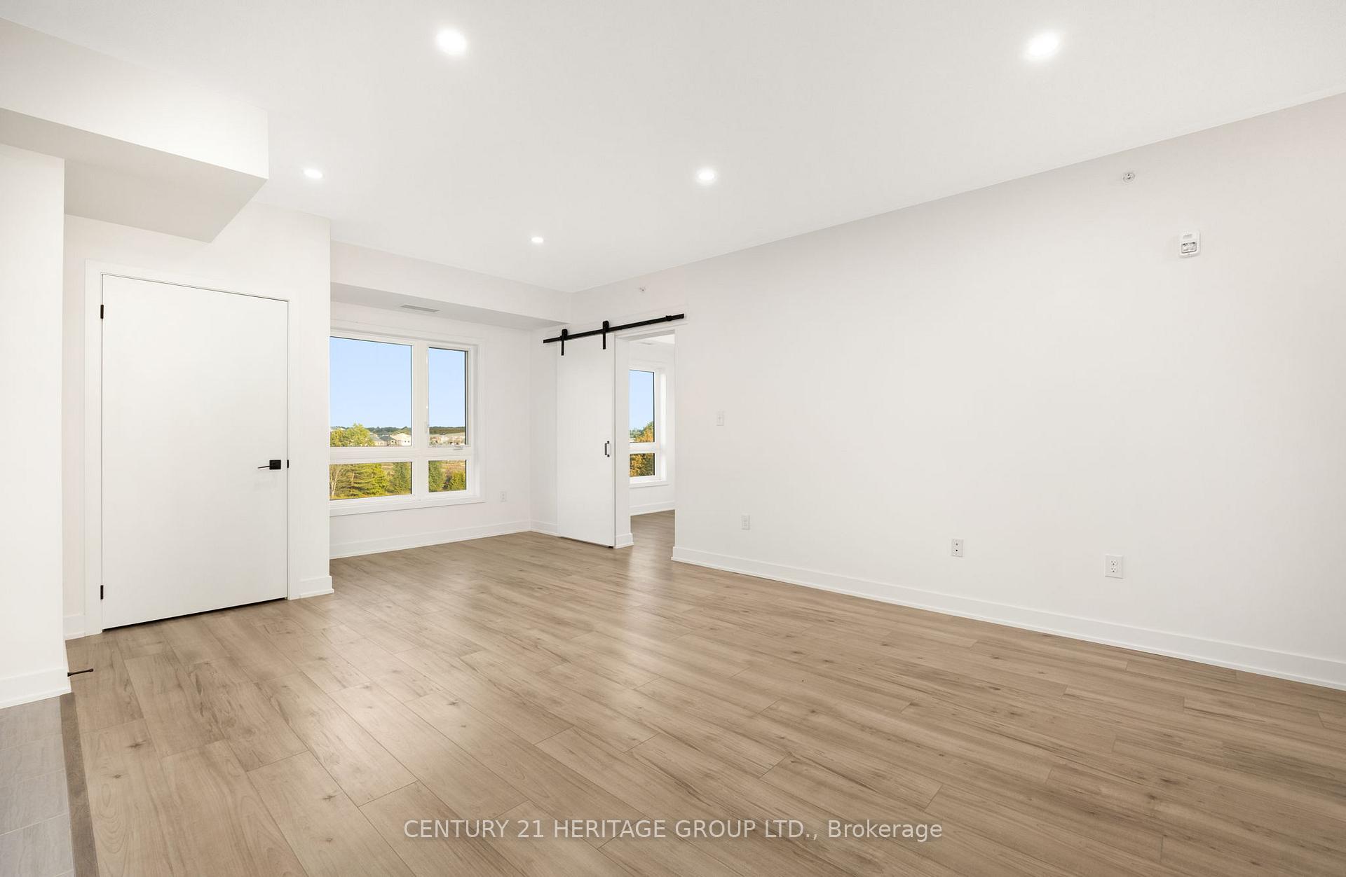Photo 6 of Unit 402, 1 Chef Lane, Barrie, Innis-Shore — HOMEH