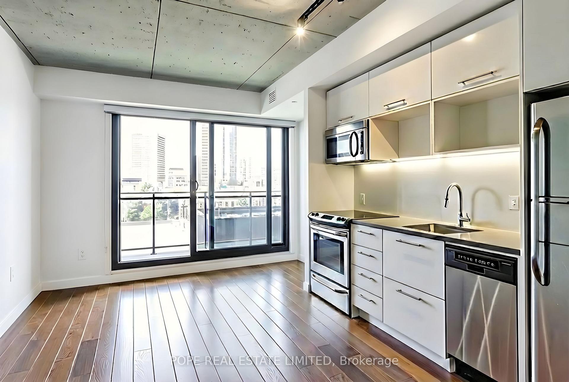 Photo 4 of Unit 719, 51 Trolley Crescent, Toronto, Moss Park — HOMEH