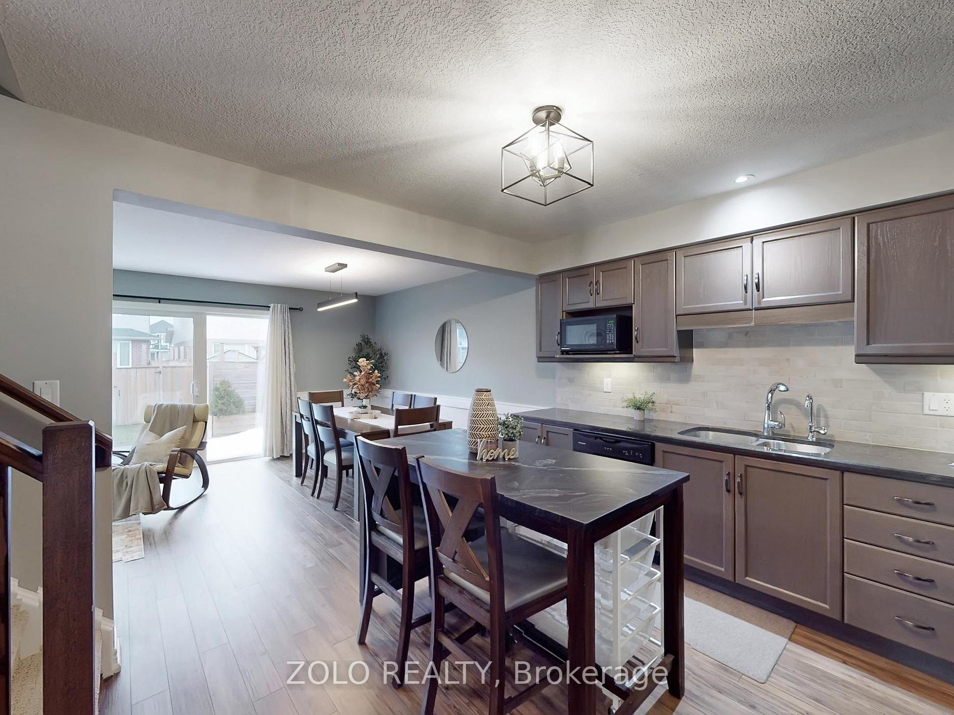 Photo 3 of 33 Marshall Drive, Guelph, Grange Road — HOMEH
