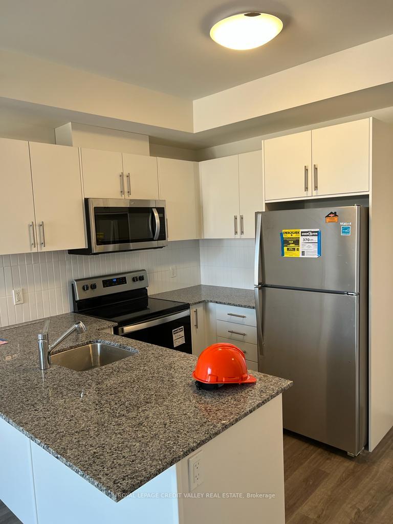 Photo 1 of Unit 303, 103 Roger Street N, Waterloo — HOMEH