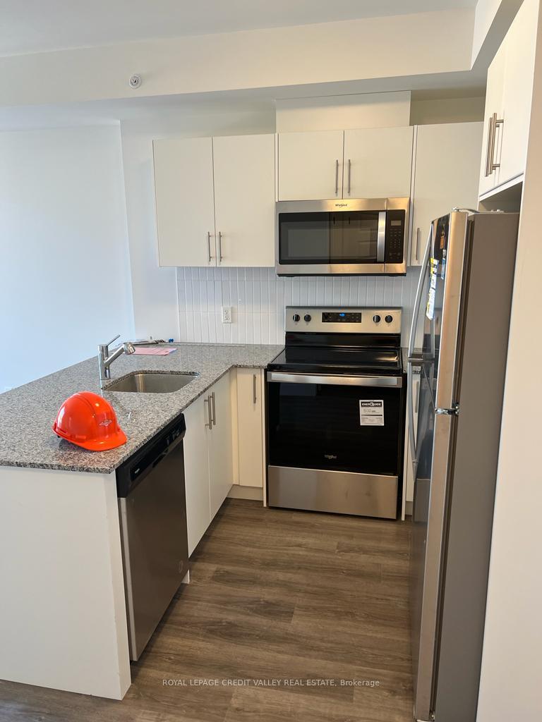 Photo 3 of Unit 303, 103 Roger Street N, Waterloo — HOMEH