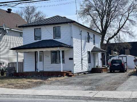 Front of 110-110a Eleventh Street E