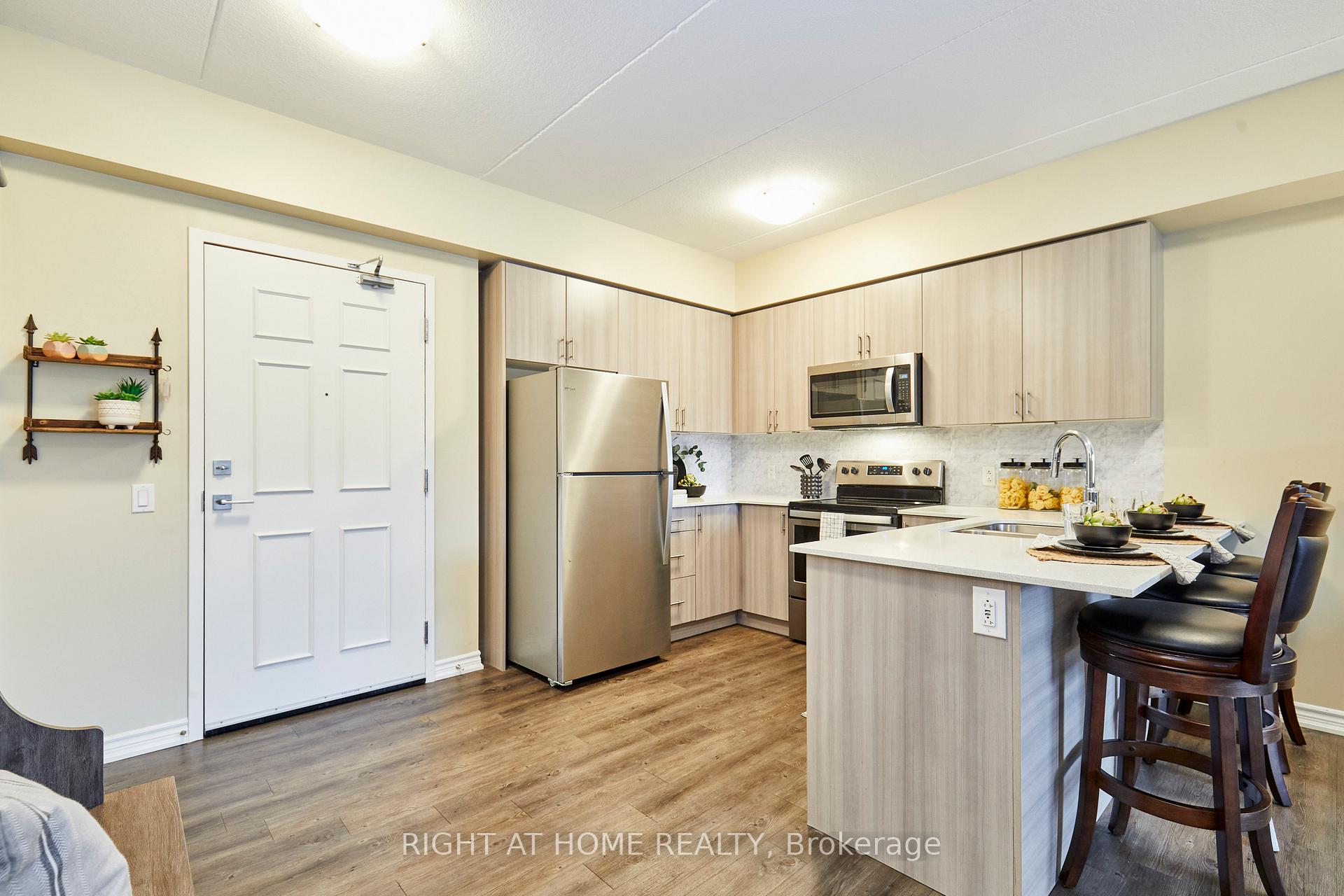 Photo 5 of Unit 201, 290 Liberty Street N, Clarington, Bowmanville — HOMEH