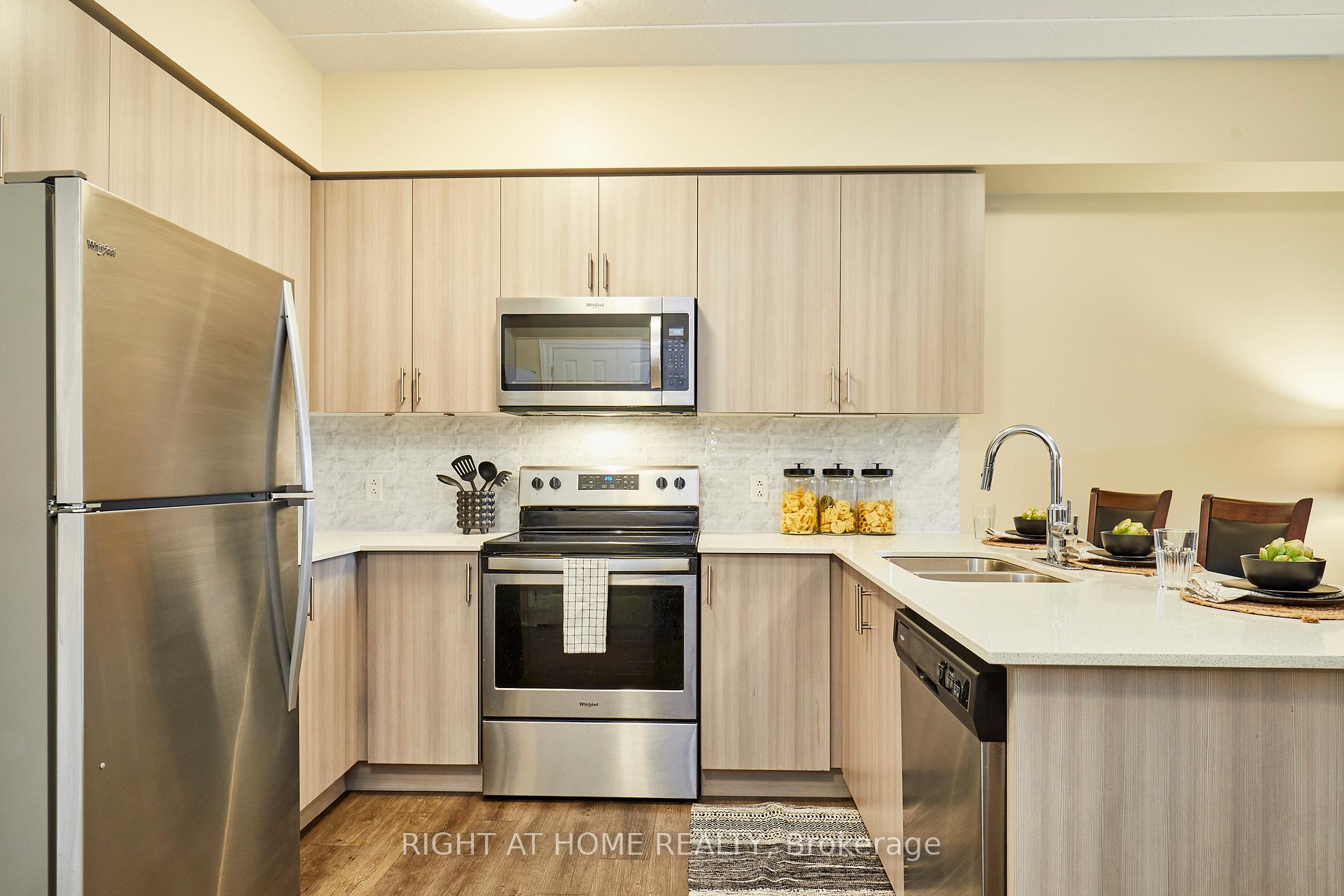 Photo 7 of Unit 201, 290 Liberty Street N, Clarington, Bowmanville — HOMEH