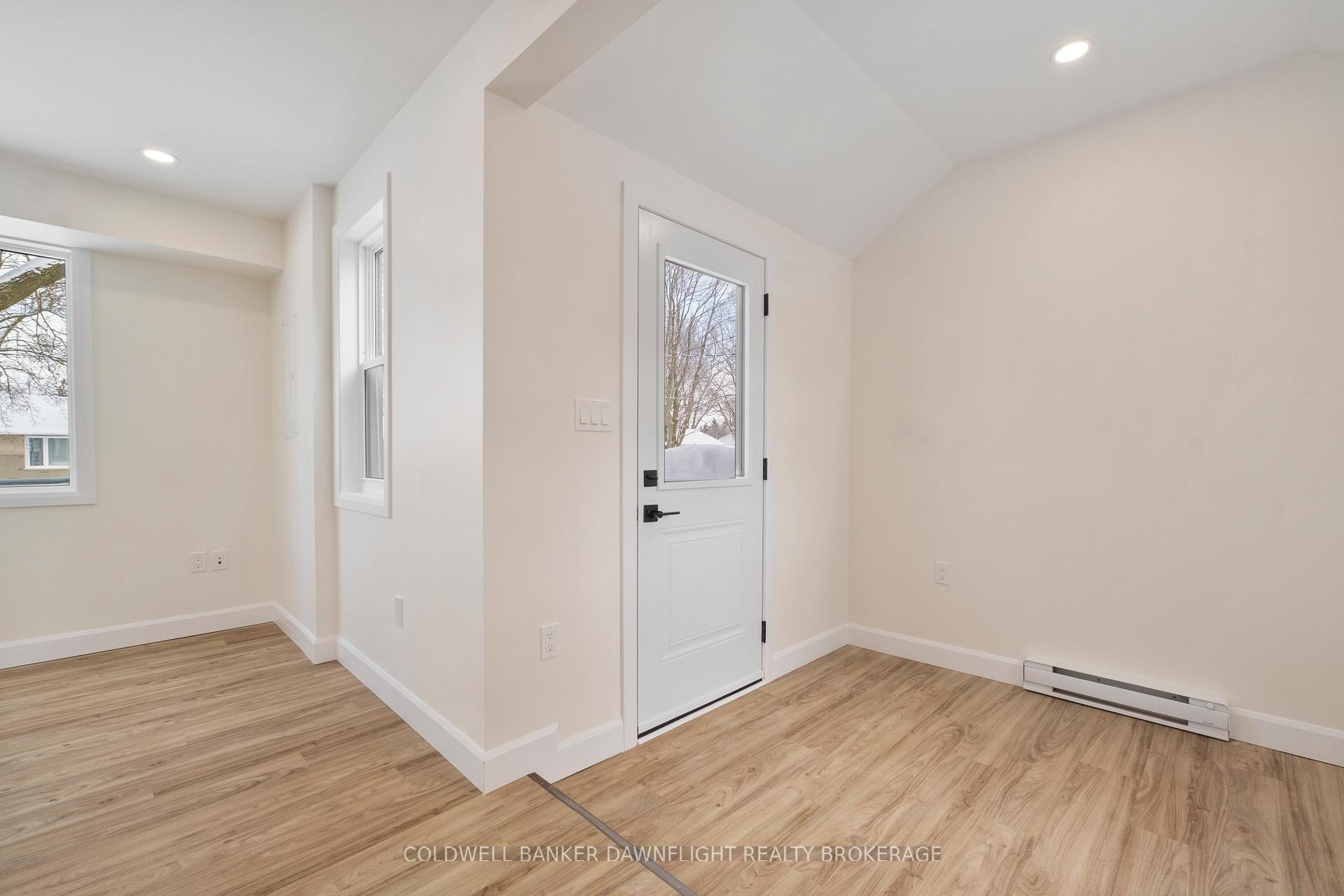 Photo 3 of Unit A (East Unit), 145 Victoria Street, South Huron, Exeter — HOMEH