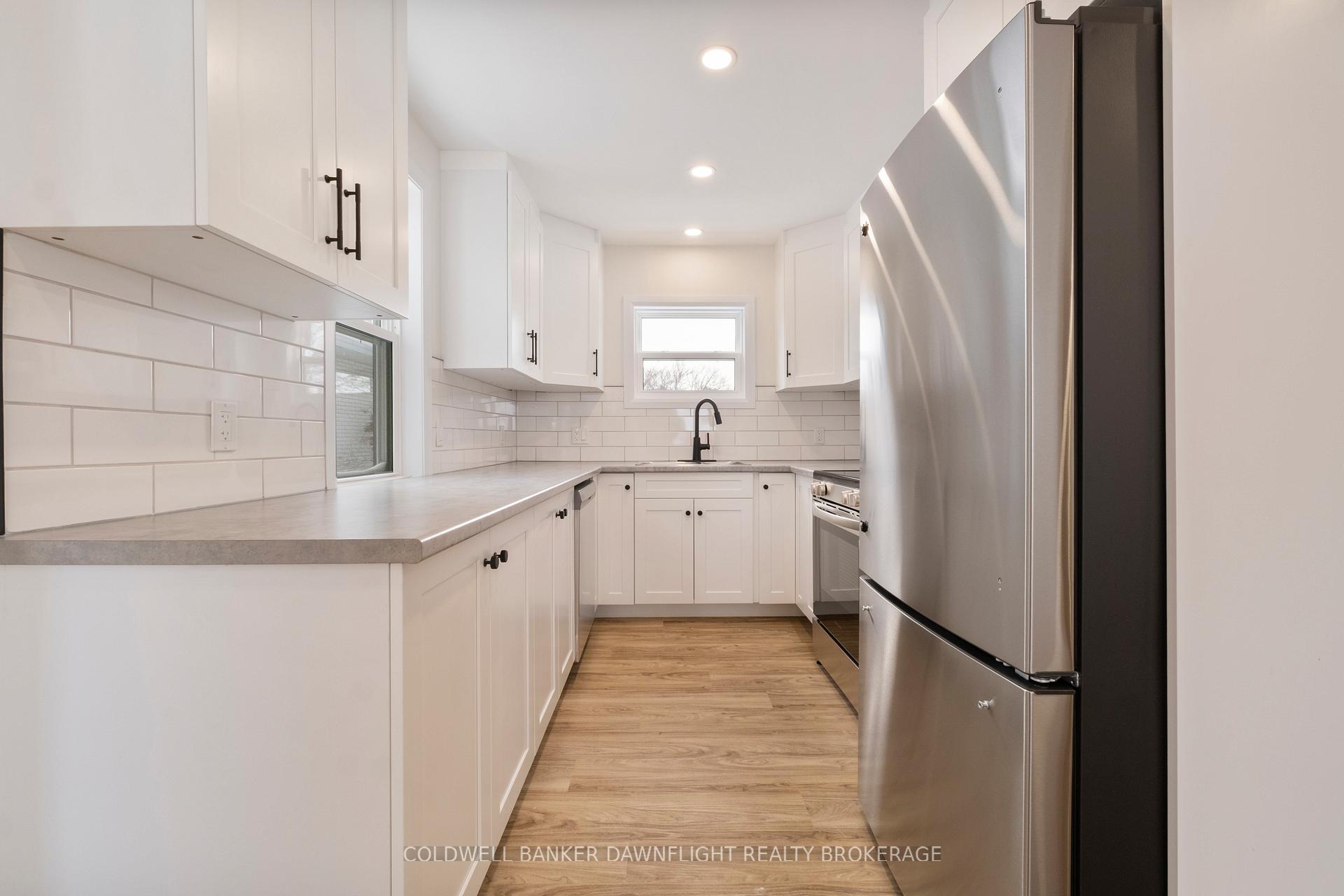 Photo 5 of Unit A (East Unit), 145 Victoria Street, South Huron, Exeter — HOMEH