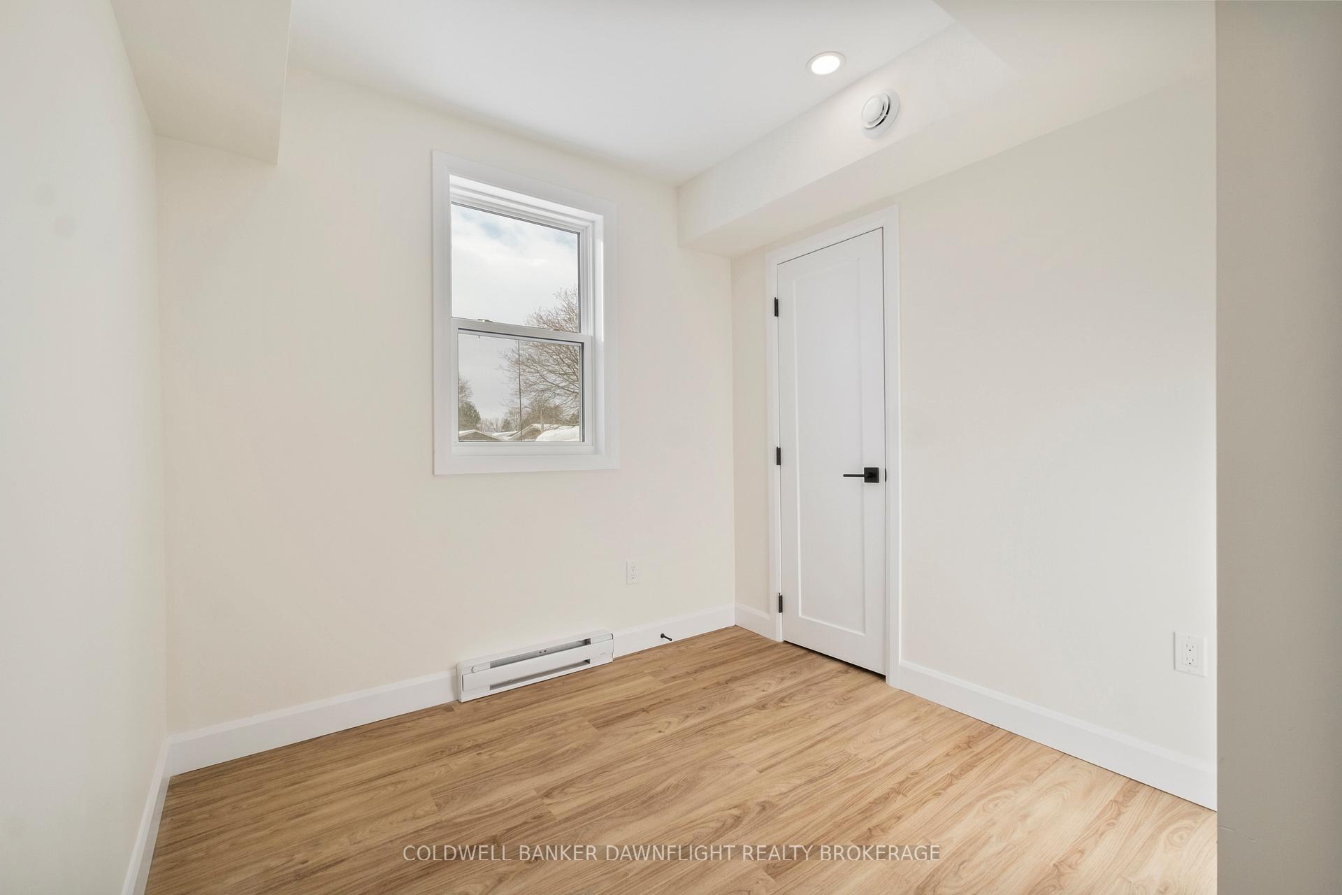 Photo 6 of Unit A (East Unit), 145 Victoria Street, South Huron, Exeter — HOMEH