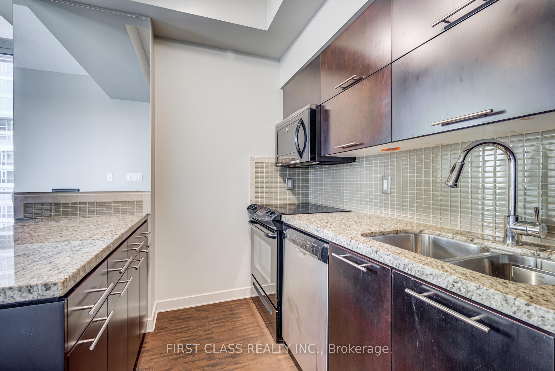 Photo 2 of Unit 1504, 126 Simcoe Street, Toronto, Waterfront Communities — HOMEH