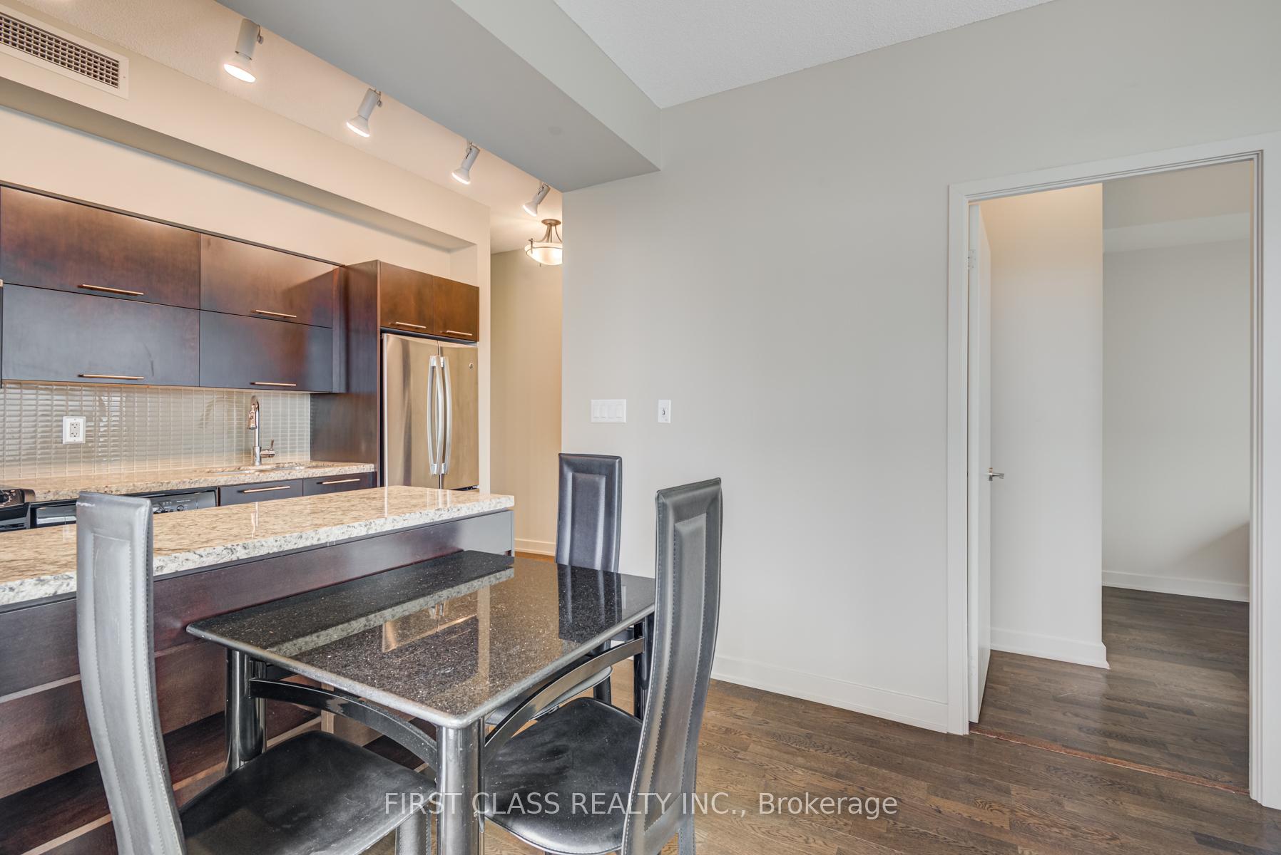 Photo 4 of Unit 1504, 126 Simcoe Street, Toronto, Waterfront Communities — HOMEH