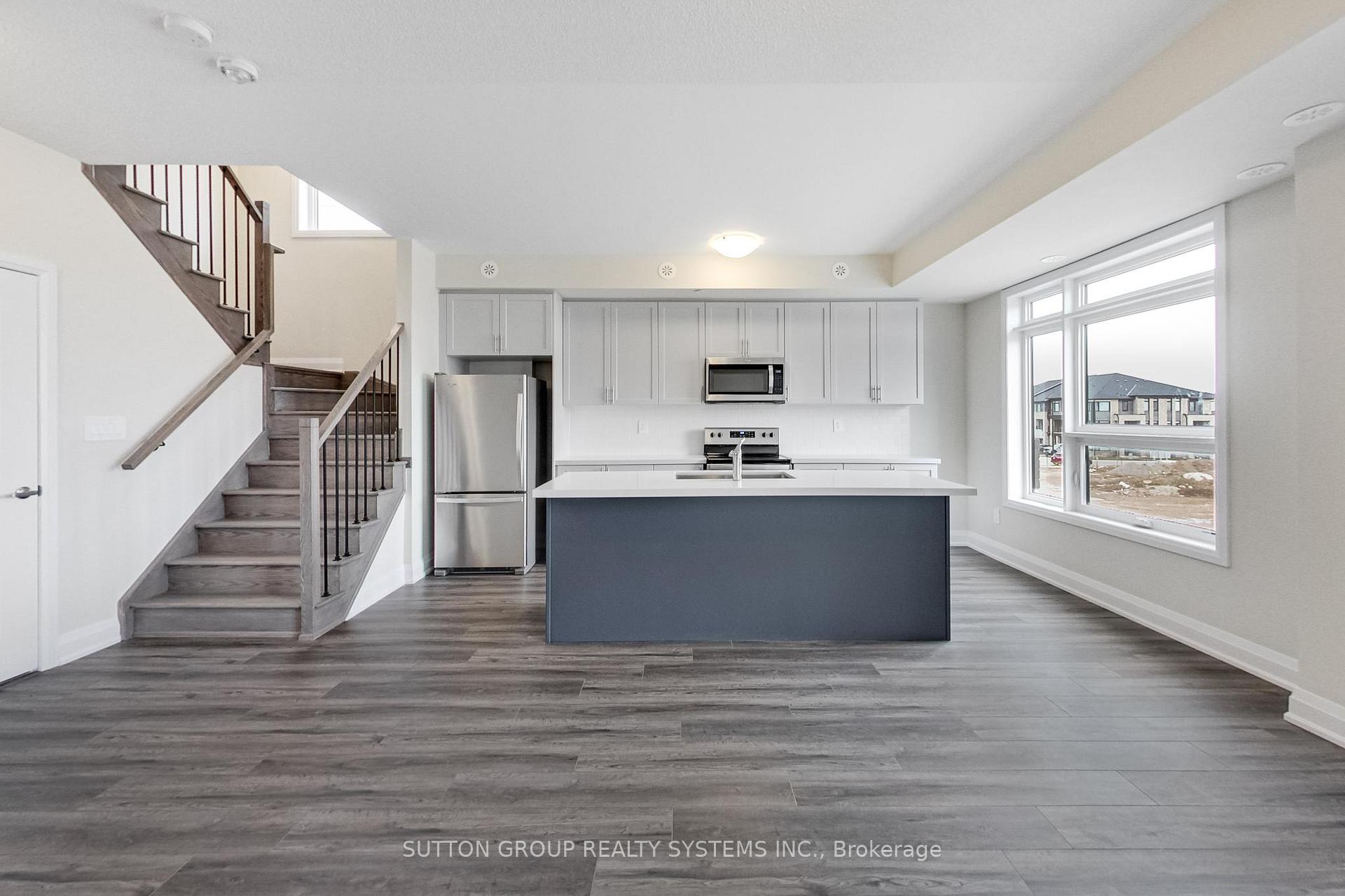 Photo 2 of Unit 103, 1577 Rose Way, Milton, Cobban — HOMEH