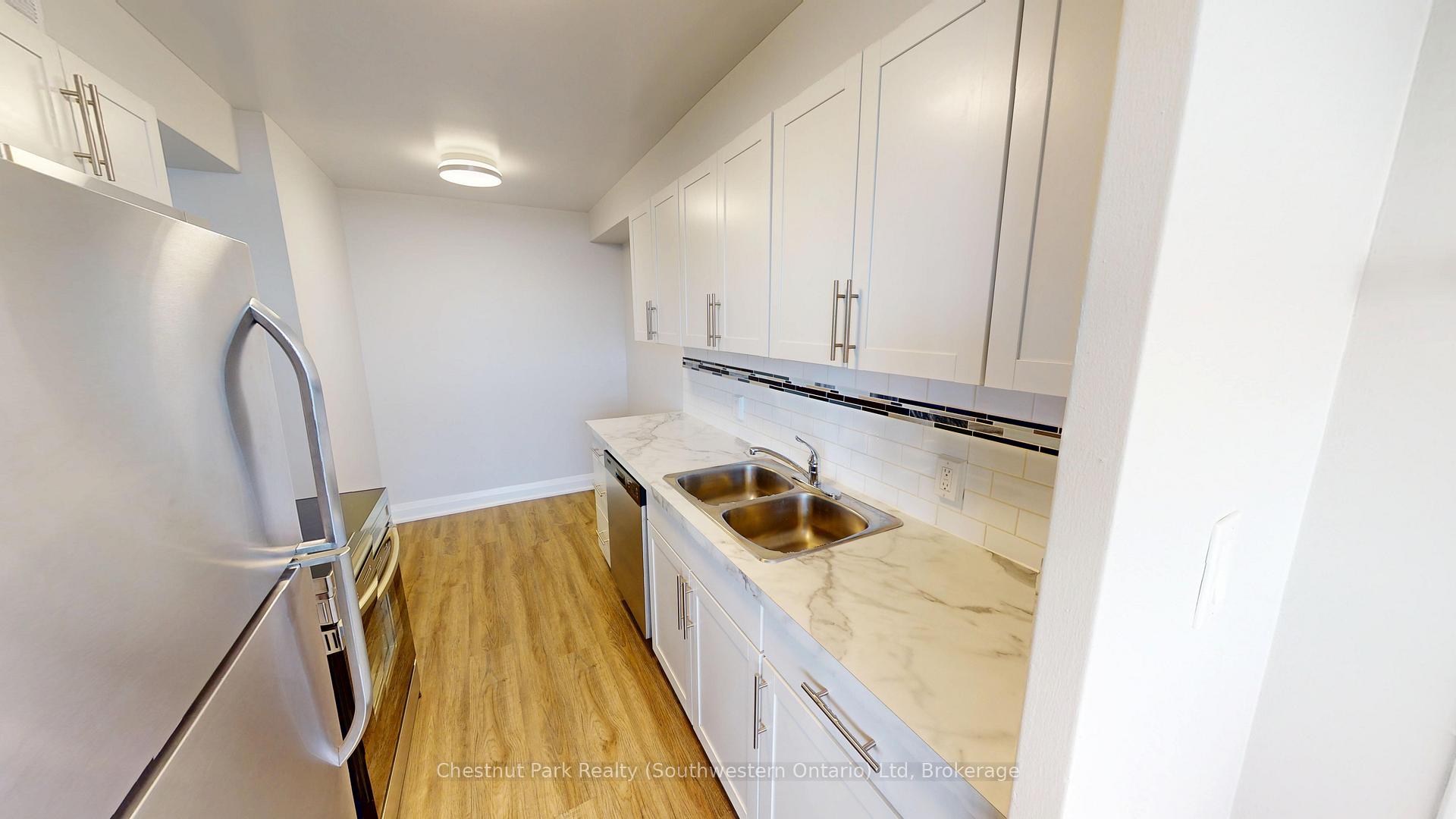 Photo 3 of Unit 1104, 2 Quebec Street, Guelph, Downtown — HOMEH