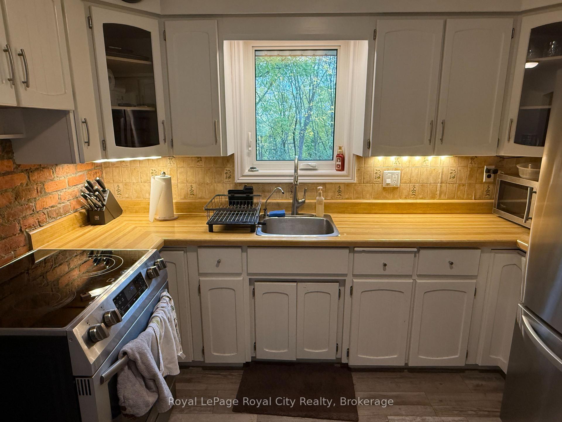 Photo 12 of Unit MAIN, 125 Grove Street, Guelph, St. George's — HOMEH