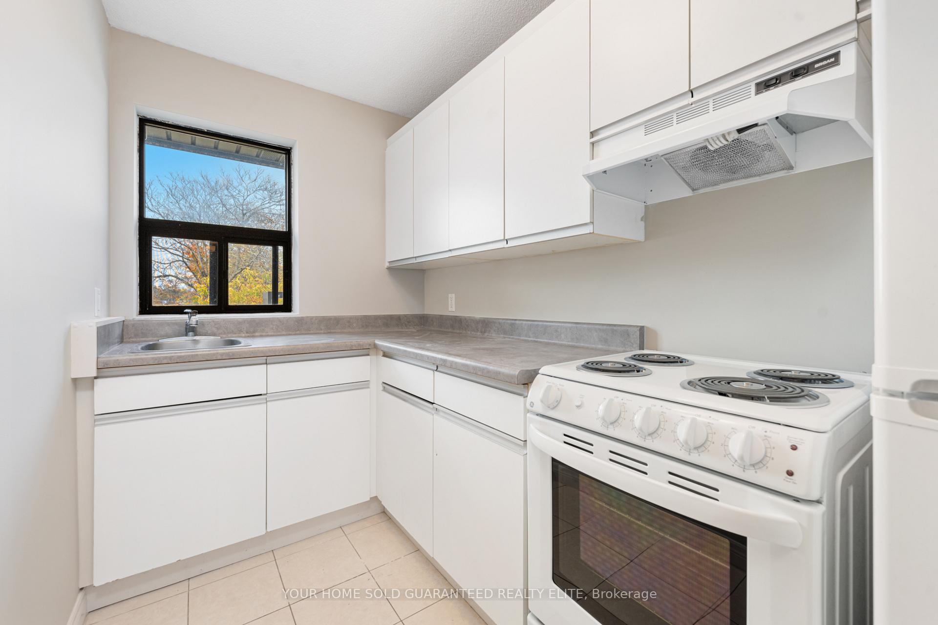 Photo 3 of Unit 2, 12 Ontario Street, Grimsby, Grimsby East — HOMEH