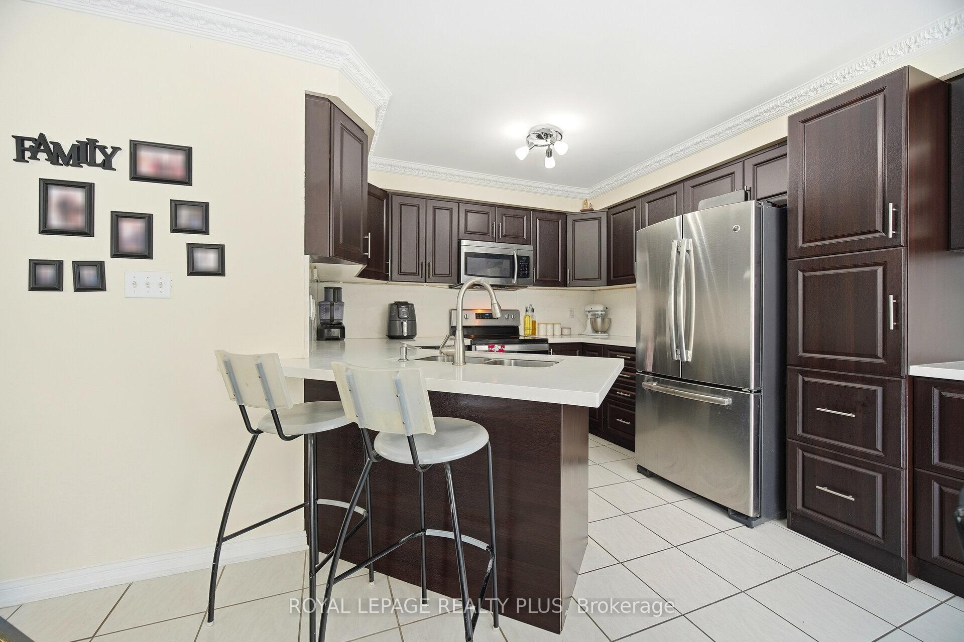 Photo 4 of 387 Brisdale Drive, Brampton, Fletcher's Meadow — HOMEH