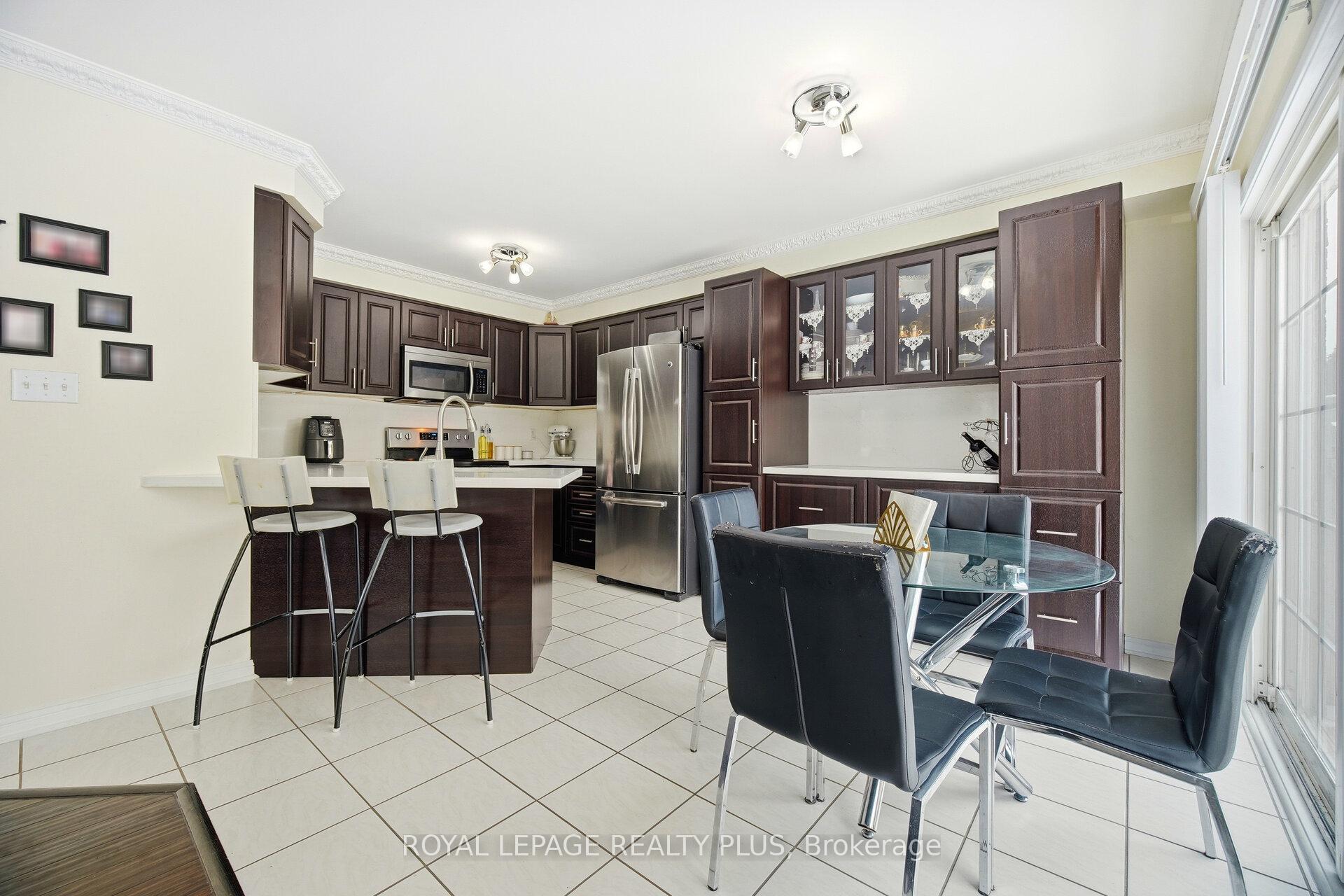 Photo 5 of 387 Brisdale Drive, Brampton, Fletcher's Meadow — HOMEH