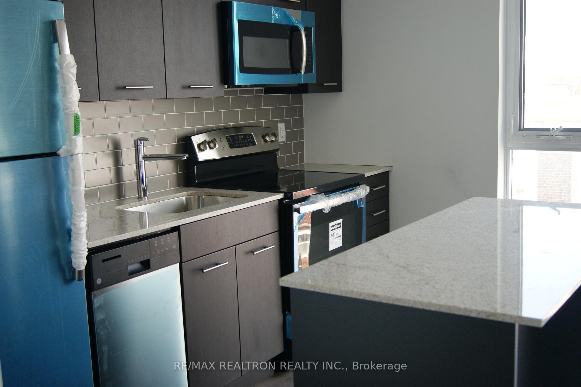 Photo 3 of Unit 410, 2055 Danforth Avenue, Toronto, Woodbine Corridor — HOMEH