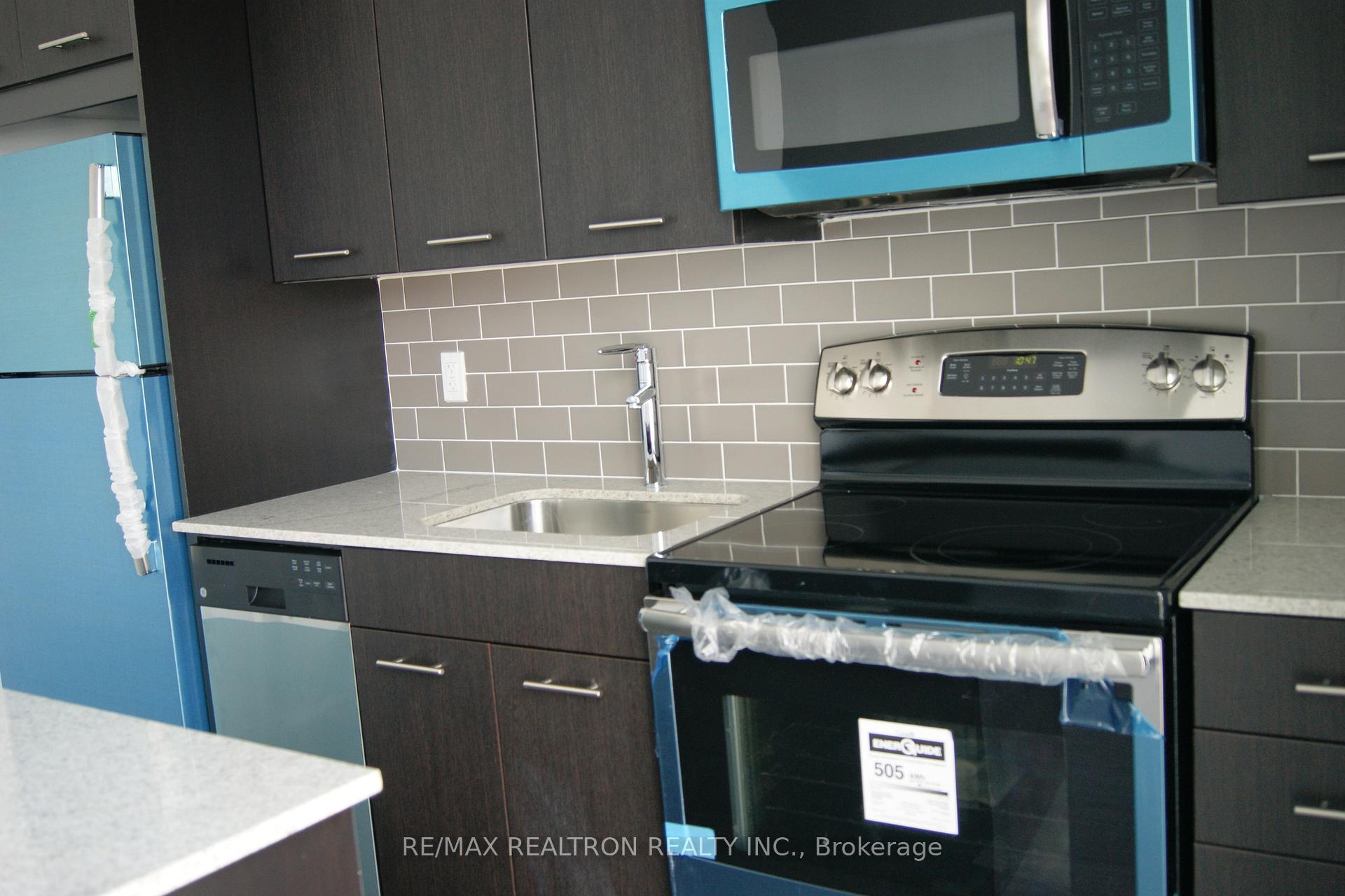 Photo 10 of Unit 410, 2055 Danforth Avenue, Toronto, Woodbine Corridor — HOMEH
