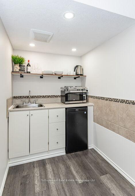 Photo 12 of Unit Basement, 63 Swift Crescent, Guelph, Grange Road — HOMEH