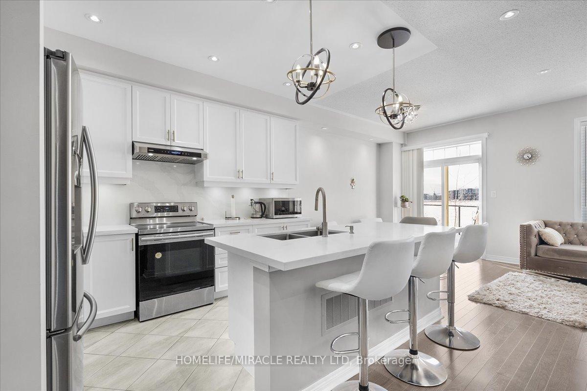 Photo 8 of 4 Hogan Manor Drive, Brampton, Northwest Brampton — HOMEH
