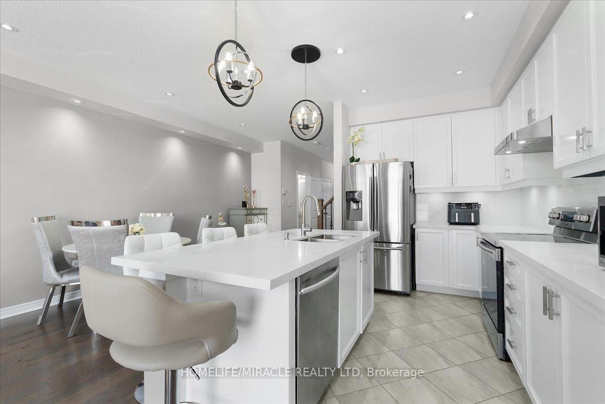 Photo 10 of 4 Hogan Manor Drive, Brampton, Northwest Brampton — HOMEH