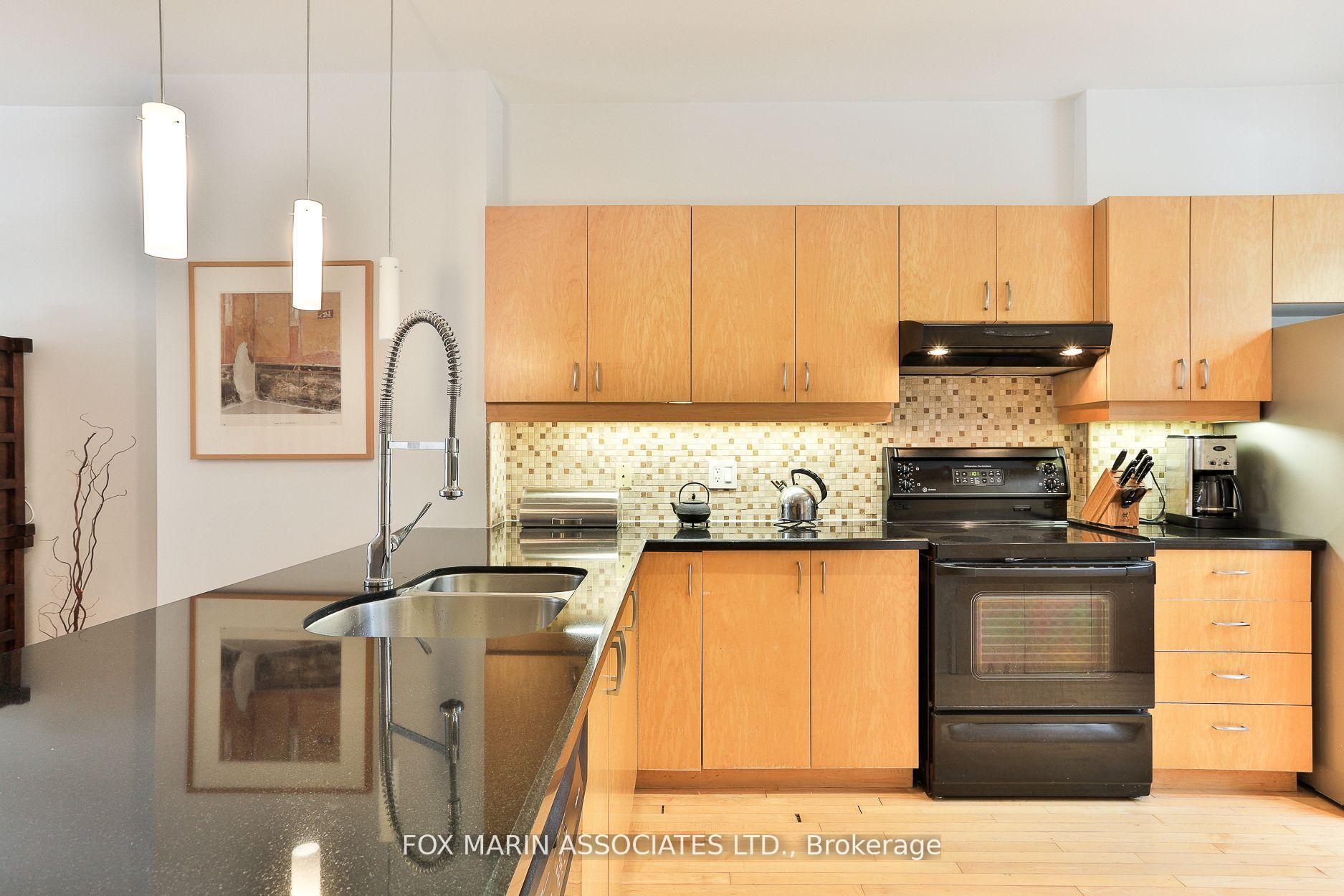 Photo 4 of 34 De Grassi Street, Toronto, South Riverdale — HOMEH