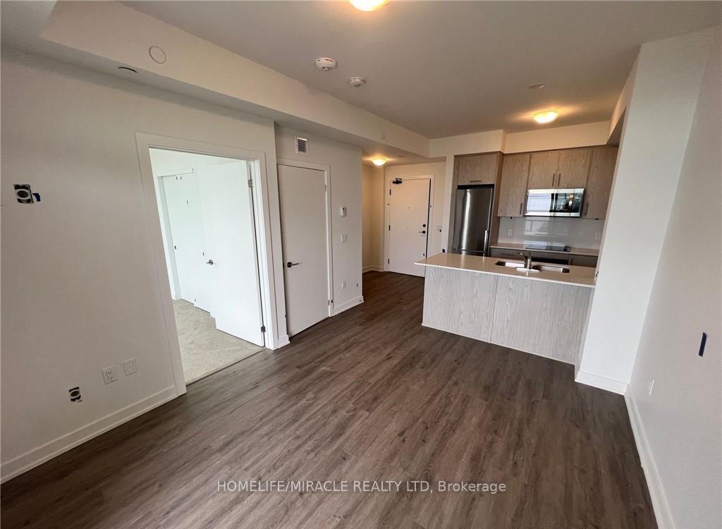Photo 3 of Unit 513, 600 North Service Road, Hamilton, Lakeshore — HOMEH