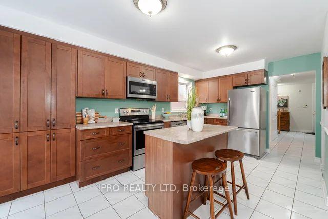 Photo 9 of 117 Ecclestone Drive E, Brampton, Brampton West — HOMEH