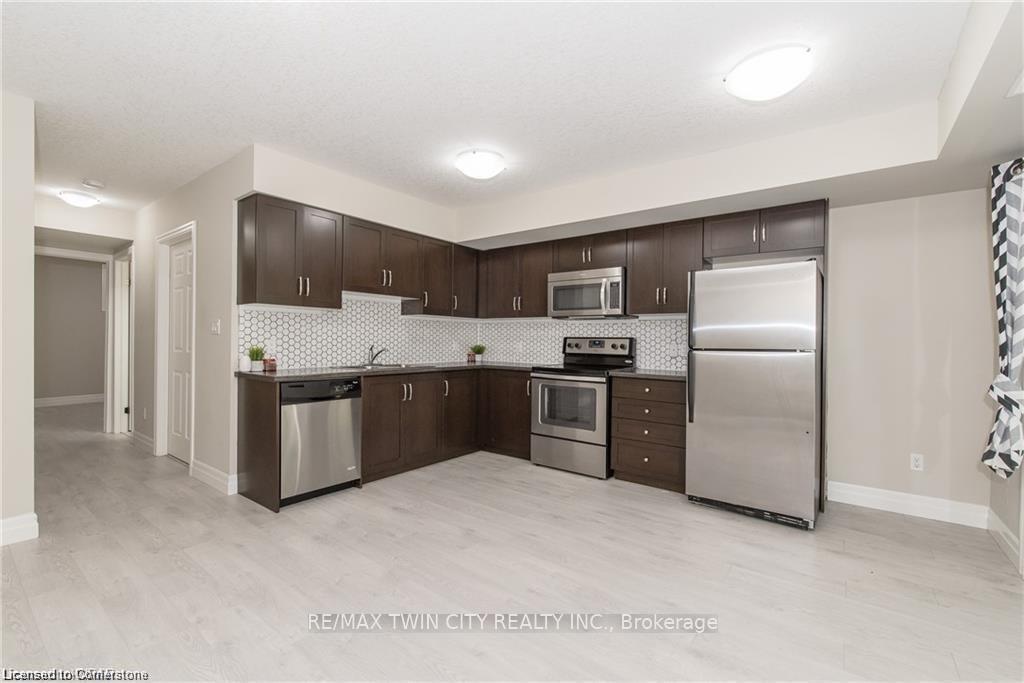 Photo 3 of Unit 6B, 1180 Countrystone Drive, Kitchener — HOMEH