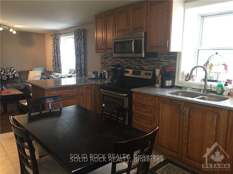Photo 6 of 1368-1370 Meadow Drive, Ottawa, Greely — HOMEH
