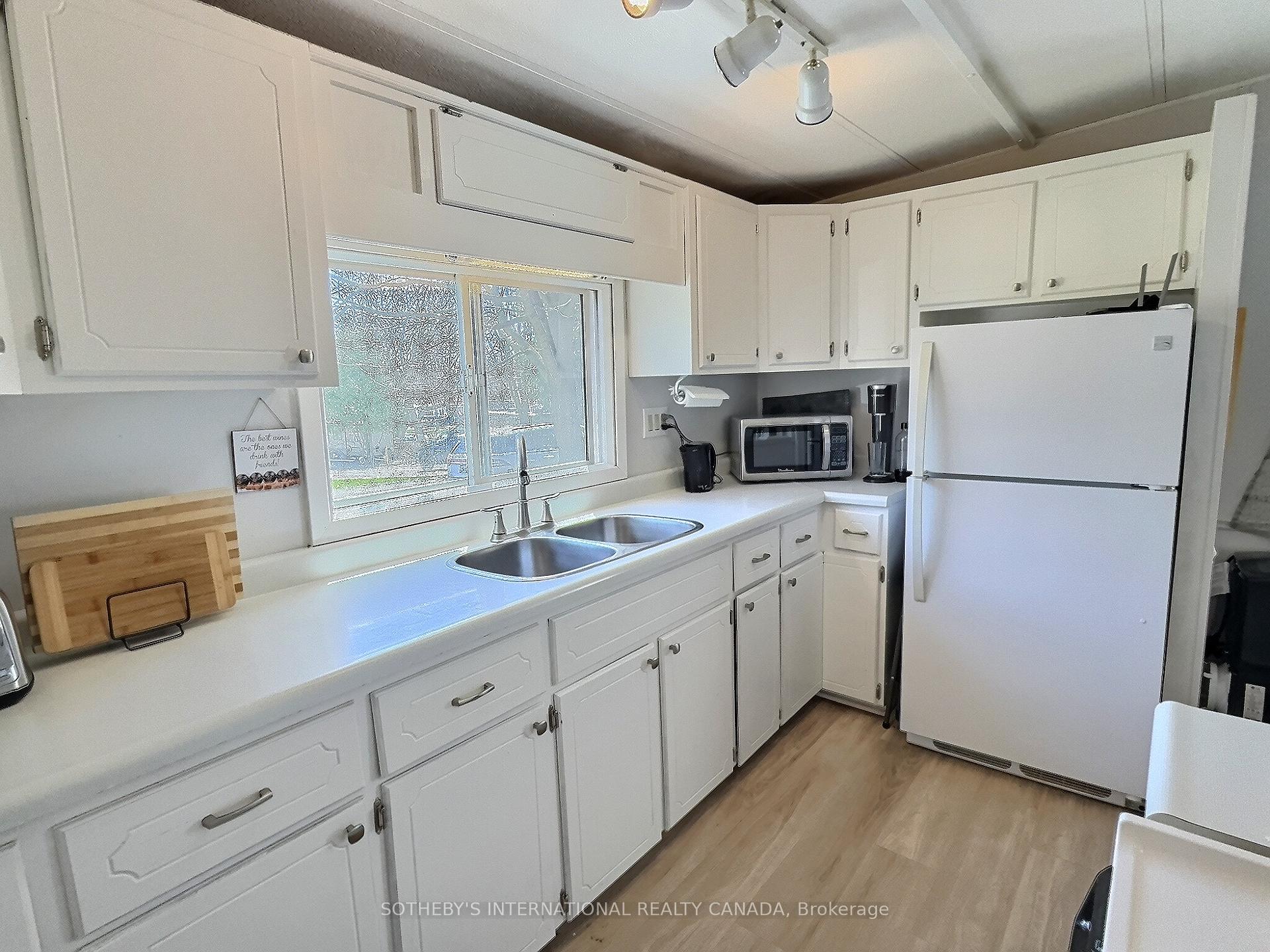 Photo 34 of Unit 21, 580 Beaver Creek Road, Waterloo — HOMEH