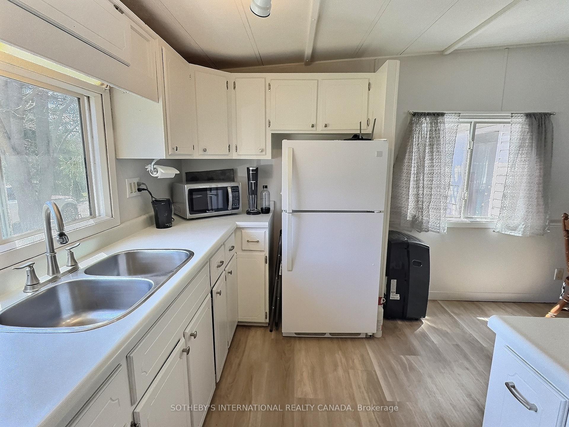 Photo 37 of Unit 21, 580 Beaver Creek Road, Waterloo — HOMEH