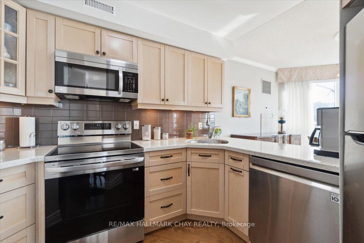 Photo 13 of Unit 307, 150 Dunlop Street E, Barrie, City Centre — HOMEH