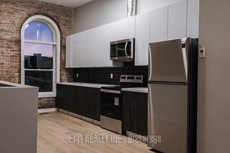 Photo 2 of Unit 216, 140 Simcoe Street, Peterborough, Town Ward 3 — HOMEH