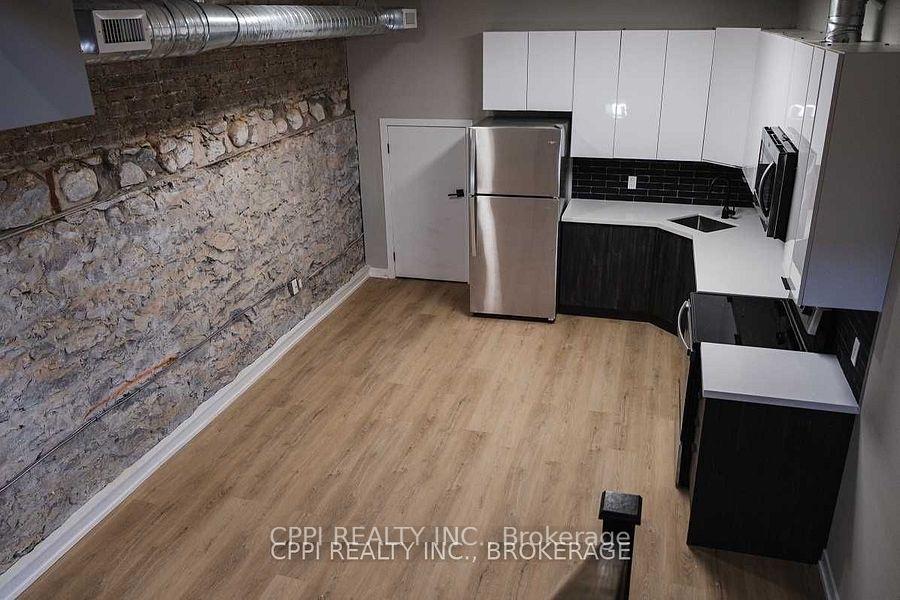 Photo 3 of Unit 103, 140 Simcoe Street, Peterborough, Town Ward 3 — HOMEH
