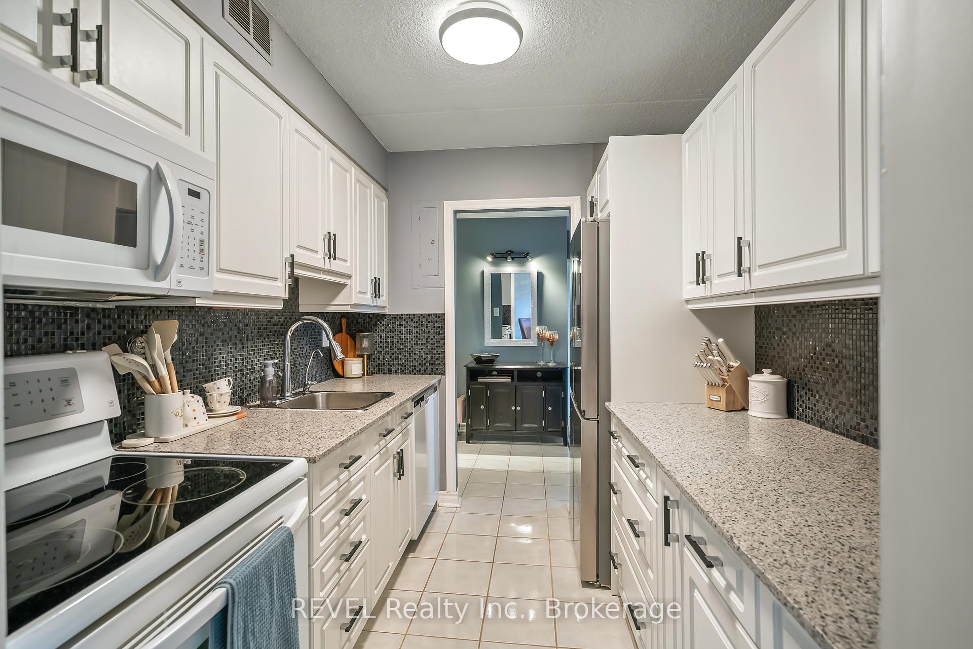 Photo 2 of Unit 421, 198 Scott Street, St. Catharines, Fairview — HOMEH