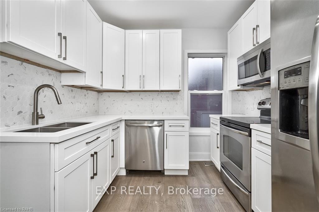 Photo 2 of Unit 2, 734 Cannon Street E, Hamilton, Gibson — HOMEH