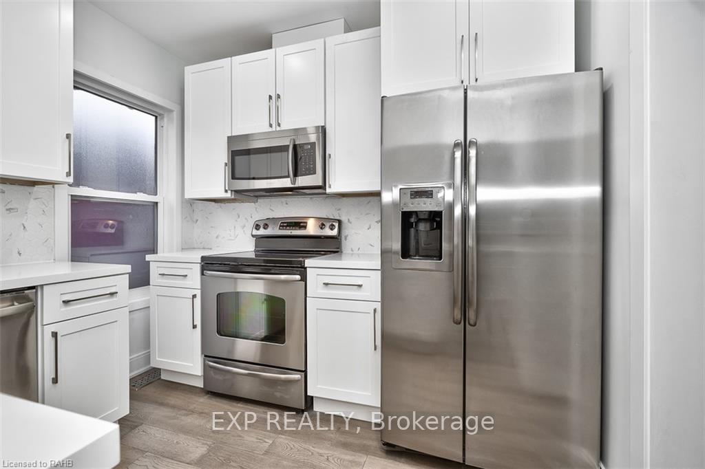 Photo 3 of Unit 2, 734 Cannon Street E, Hamilton, Gibson — HOMEH