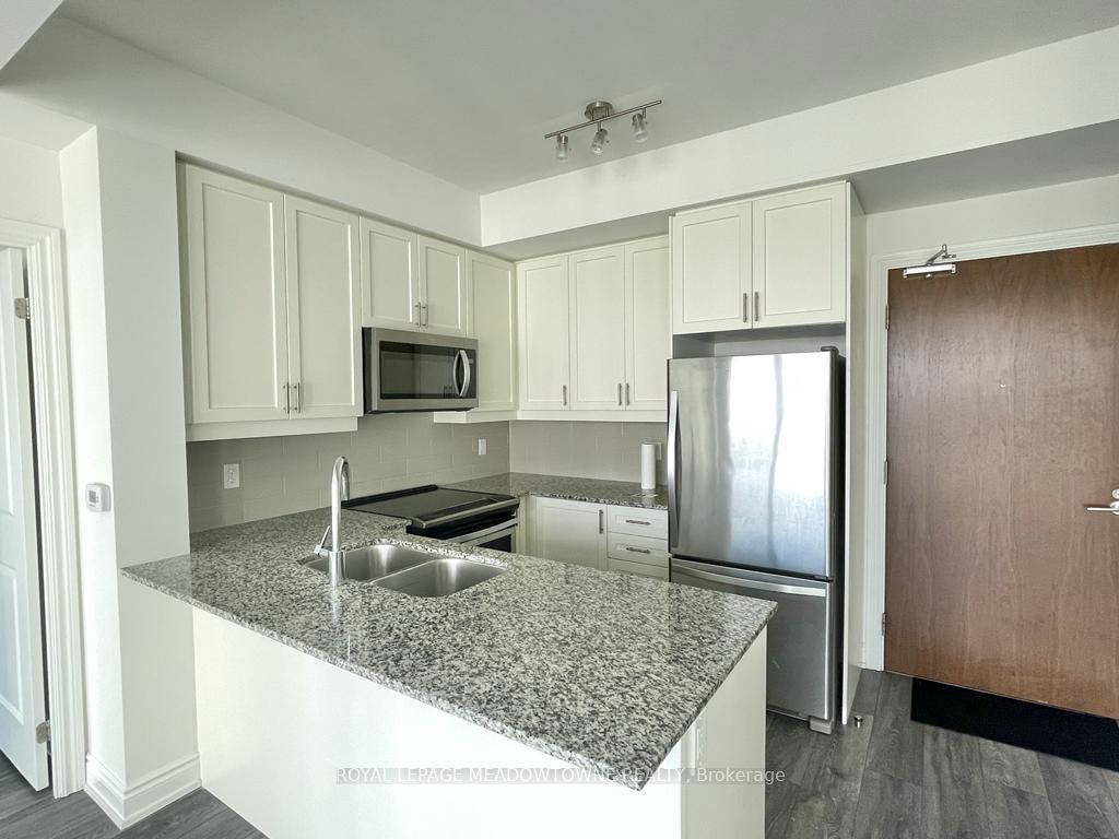 Photo 5 of Unit 603, 1050 Main Street E, Milton, Dempsey — HOMEH