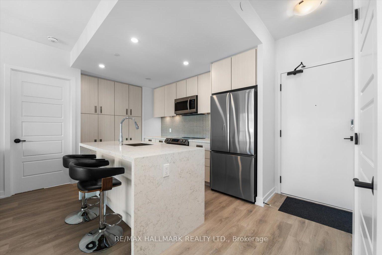 Photo 2 of Unit 311, 415 Sea Ray Avenue, Innisfil, Rural Innisfil — HOMEH