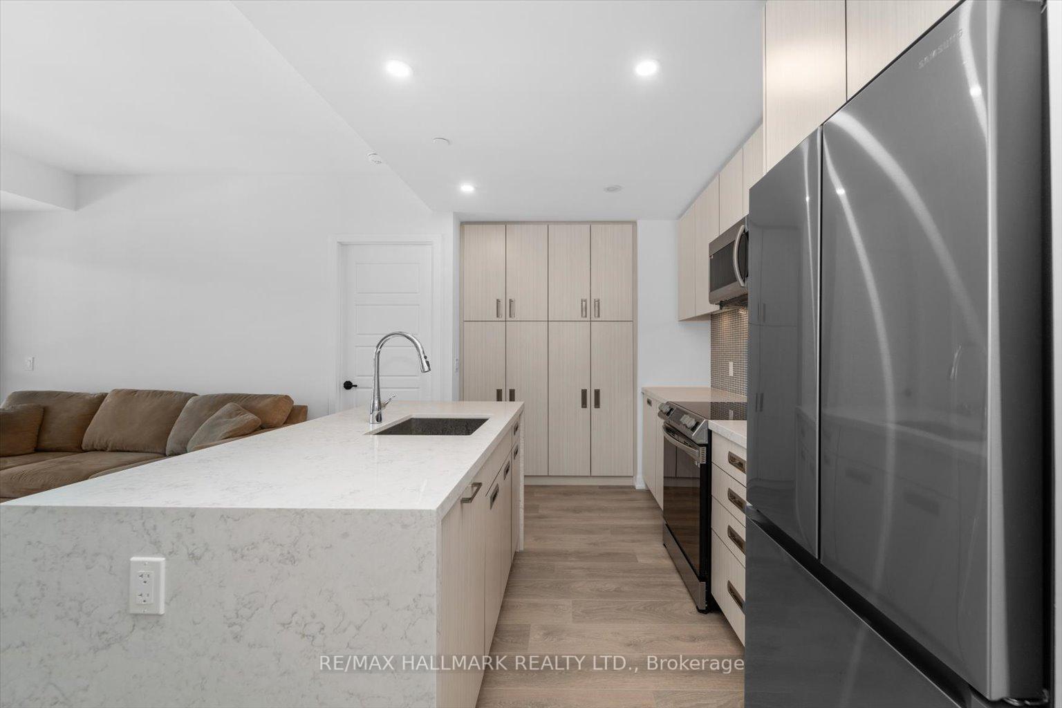 Photo 3 of Unit 311, 415 Sea Ray Avenue, Innisfil, Rural Innisfil — HOMEH