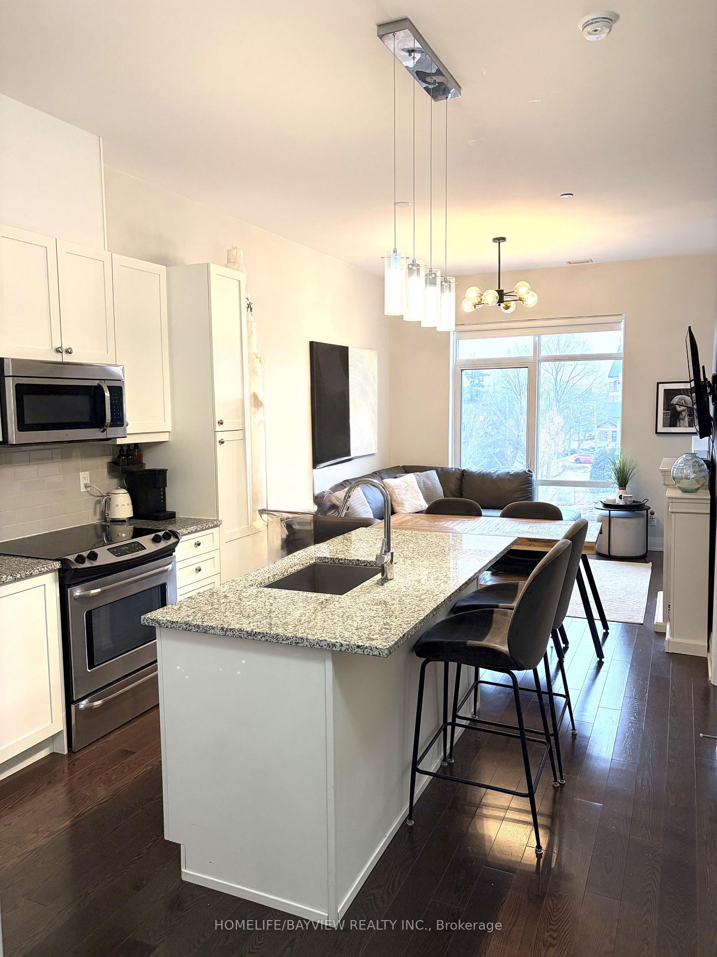 Photo 5 of Unit 415, 15277 Yonge Street, Aurora, Aurora Village — HOMEH