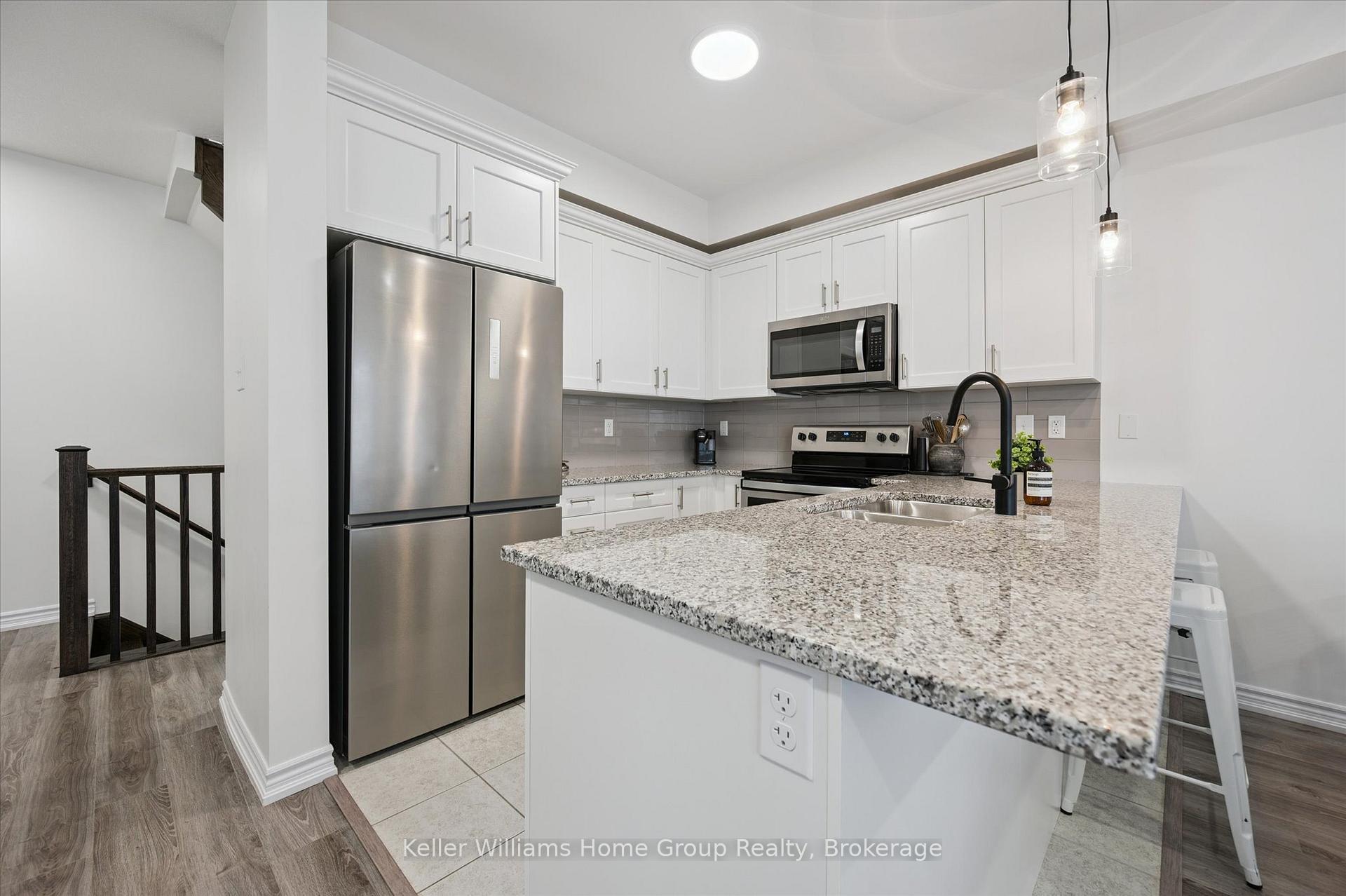 Photo 31 of Unit 17, 88 DeCorso Drive, Guelph, Kortright East — HOMEH