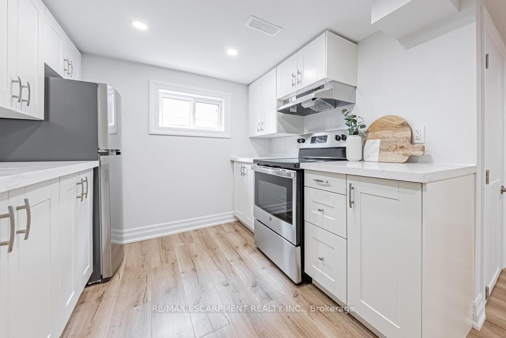 Photo 5 of Unit LOWER, 587 Queensdale Avenue E, Hamilton, Eastmount — HOMEH