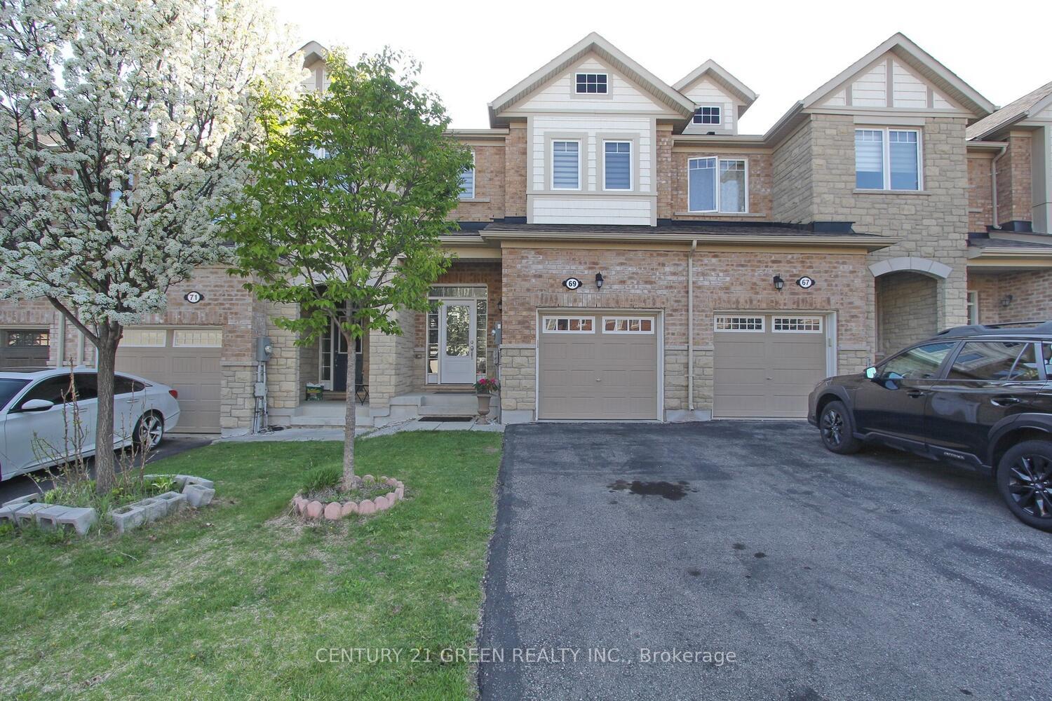 Front of 69 Maple Cider Street