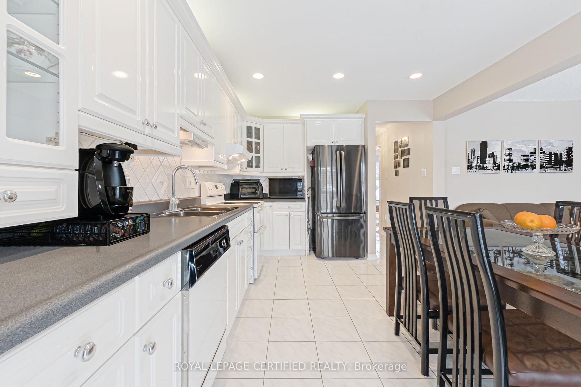 Photo 9 of 116 Malta Avenue, Brampton, Fletcher's Creek South — HOMEH